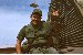 CW2 George Miller with a Tommy gun.