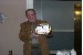 Don Yaxley receives a thank you from his fellow 222nd CAB Skymasters for his work on the reunion.