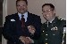 Rodney Brown, Hillclimber '67 to '68, receives a 765th Trans Bn coin from LTC Lundren.